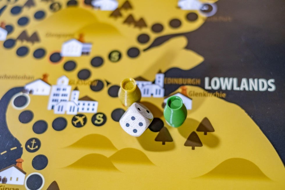 Dice and game pieces close-up